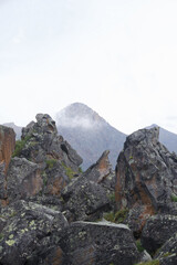 summer mountain landscape. Caucasus mountains, Elbrus region. sunbeams and beautiful, expressive cloudy sky