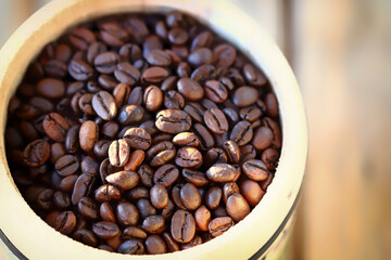Selective focus. Coffee beans in a cup.
