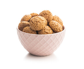 Amaretti biscuits in bowl. Sweet italian almond cookies.