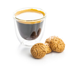 Amaretti biscuits. Sweet italian almond cookies and coffee cup