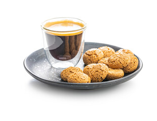 Amaretti biscuits. Sweet italian almond cookies and coffee cup