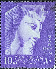 Egypt - Circa 1958: A post stamp printed in Egypt showing a portrait of Ramses II - inscribed UAR