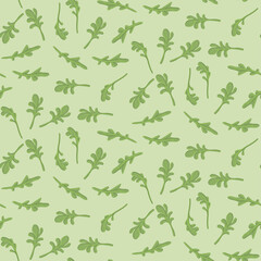 Seamless pattern of fresh green leaves of arugula. 