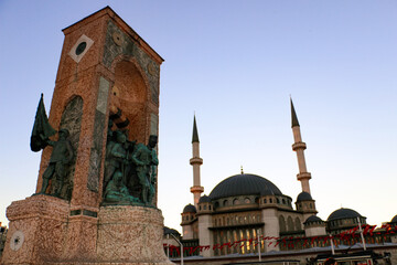 Fototapeta na wymiar 26.09.2021 Taksim Turkey: Atatürk statue and new Taksim mosque in Taksim, the most crowded district of Istanbul during the coronavirus period. 