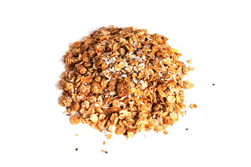 Granola from whole oat flakes with coconut chips, pineapple and chia seeds isolated on a white background. Muesli isolated. A quick breakfast. Healthy breakfast.