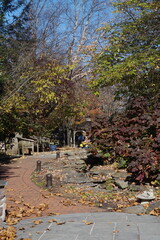 Park with Gazebo and Benches and Trees with Autumn Colors in Sunlight