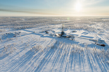 drilling platform in winter in the tundra	