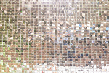 Full frame silver sequins curtain background texture.