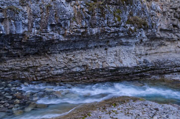 Water rushing through Johnston Canyon