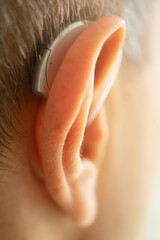 Hearing aid ear of man
