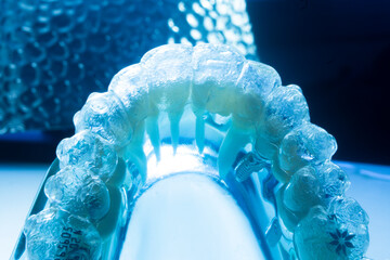 Invisible bracket aligners