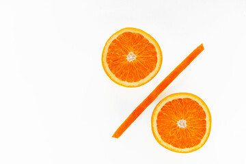 Percentage sign made of orange slices on white background. Sale concept.