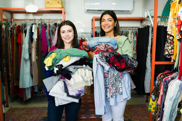 Young women buying clothes