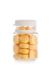 Bottle of vitamin A pills on white background