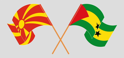 Crossed and waving flags of North Macedonia and Sao Tome and Principe