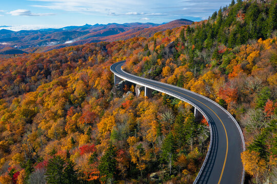 The Blue Ridge Parkway road in North Carolina during the Fall colored trees.