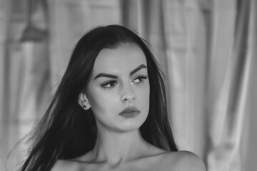 Naklejka premium Portrait of a young beautiful woman