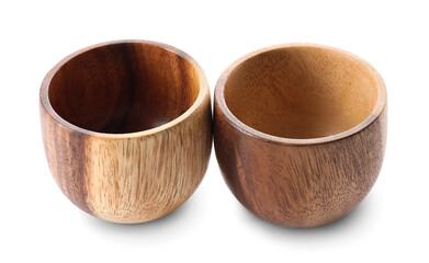 Empty wooden bowls on white background