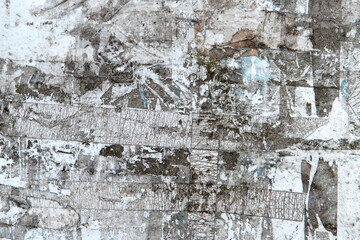 Torn Poster Paper Wall Texture Pattern as Urban Background Vintage.