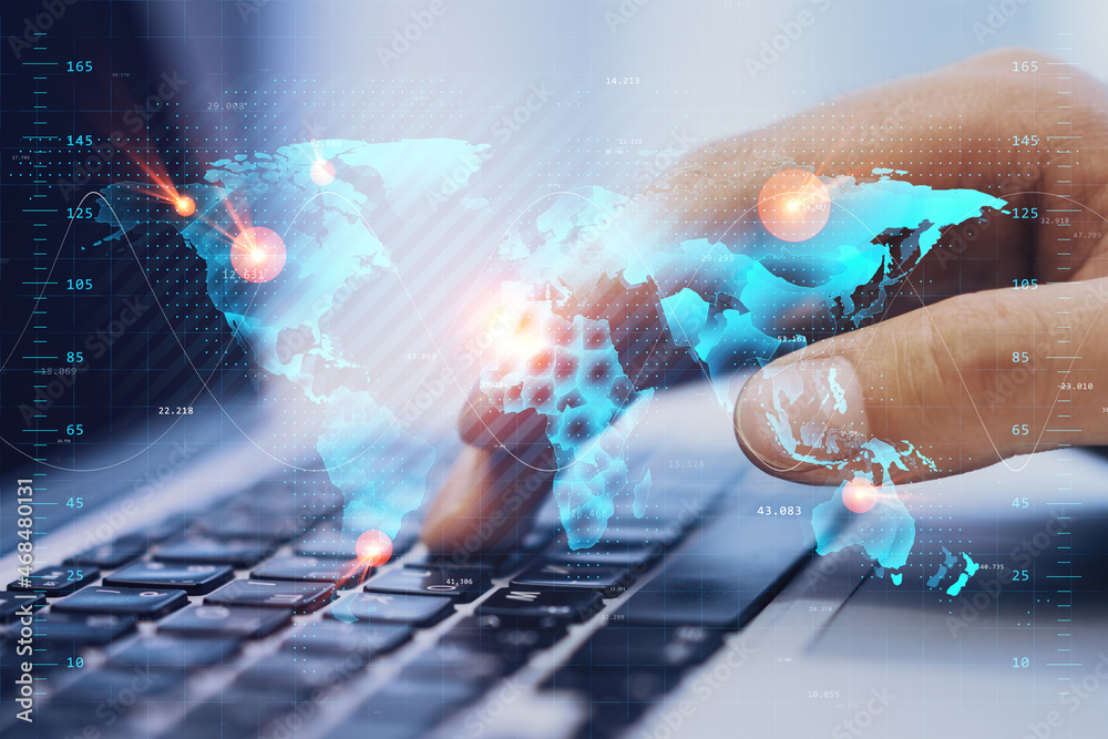 Poster close up of hand using laptop at desktop with creative glowing map hologram on blurry background. te