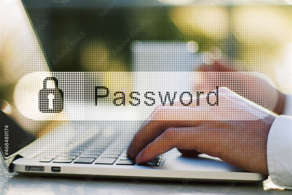 Poster close up of male hands using laptop with creative password bar on desktop with coffee cup and blurry