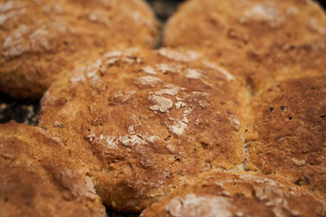 Small loaves of bread with seeds. Selective focus