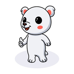Cute little polar bear cartoon giving thumb up