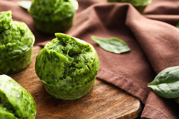 Fototapeta premium Tasty spinach muffins on table, closeup