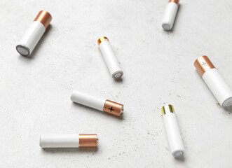Alkaline batteries on light background