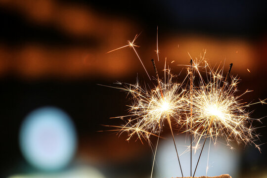Beautiful sparklers at night outdoors