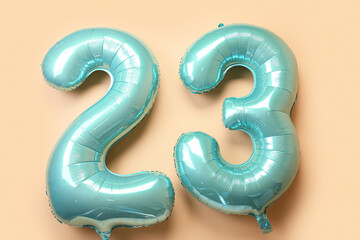 Figure 23 made of balloons on beige background