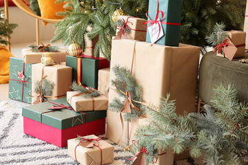 Fototapeta na wymiar Many presents under Christmas tree in living room