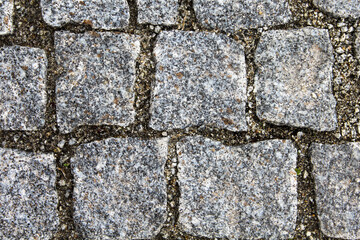 Square stone floor, parallel close-up