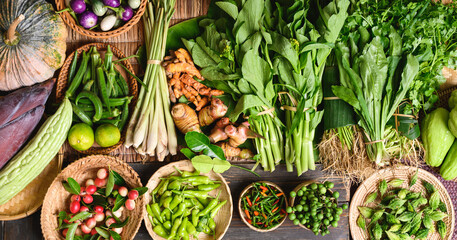 Fresh organic Southeast Asian vegetables and spices from local farmer market, Northern of Thailand,...