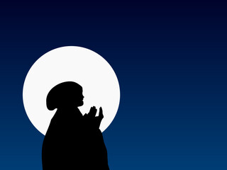 silhouette of woman praying at night
