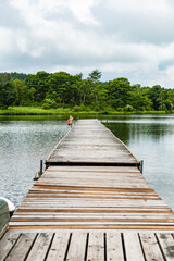 Obraz premium wooden bridge over the lake