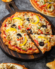 pizza on a wooden board