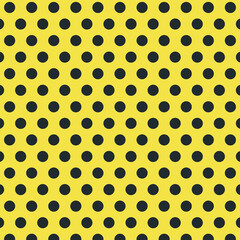 yellow black polka dots seamless pattern retro stylish vintage yellow background concept for fashion print