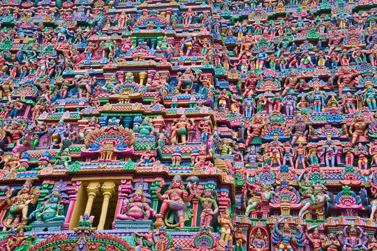 Colorful idols on the Gopuram, Sarangapani Temple. One of the ancient temples in the south of India. Tamil Nadu, India.