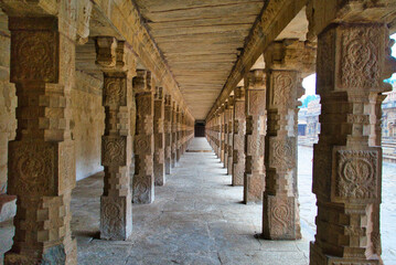 Ancient and simple carved stone pillars. Airavateswara temple. One of the ancient temples in the south of India. Tamil Nadu, India.