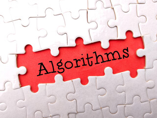 White puzzle with text Algorithms on a red background.