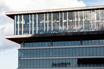 Dandenong justice service centre standing tall on blue skyline.