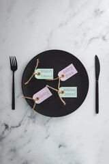 plant-based and animal-based labels next to dairy and dairy-free ones on top of black dining plate...