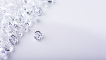 Diamond with tweezers and magnifier.reflections on the ground. brilliant cut diamond held by tweezers.Gemstone Beauty