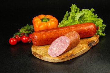 Pork ham sausage cut isolated