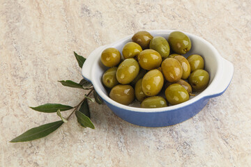 Tasty marinated olives in the bowl