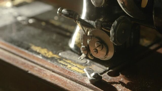 Still life with old sewing machine by window