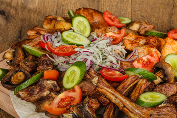 Grilled various meat mix vith vegetables