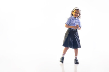 Portrait of a girl in school uniform going to school