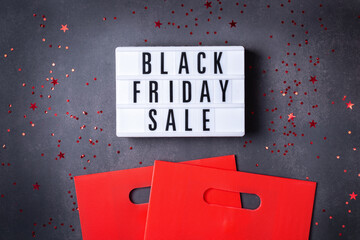 Black Friday Sale pattern with red boxes and shopping bags